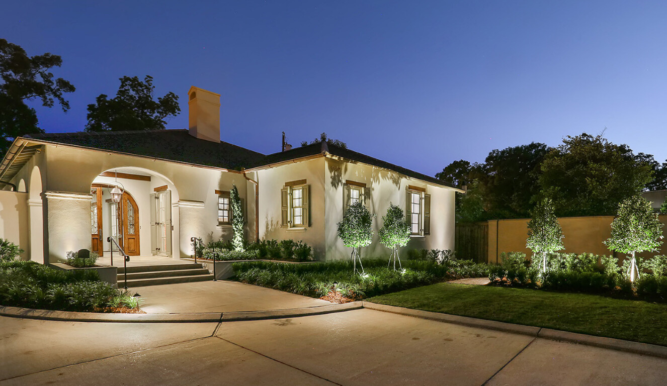 Stamped decorative concrete driveway with elegant lighting in Tampa area